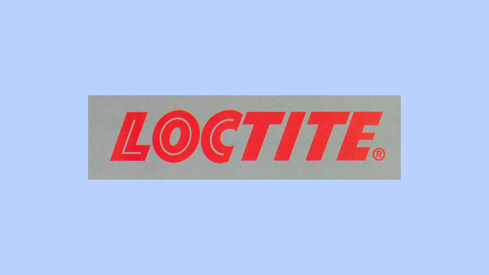 灰色背景上的红色乐泰（Loctite）标识。